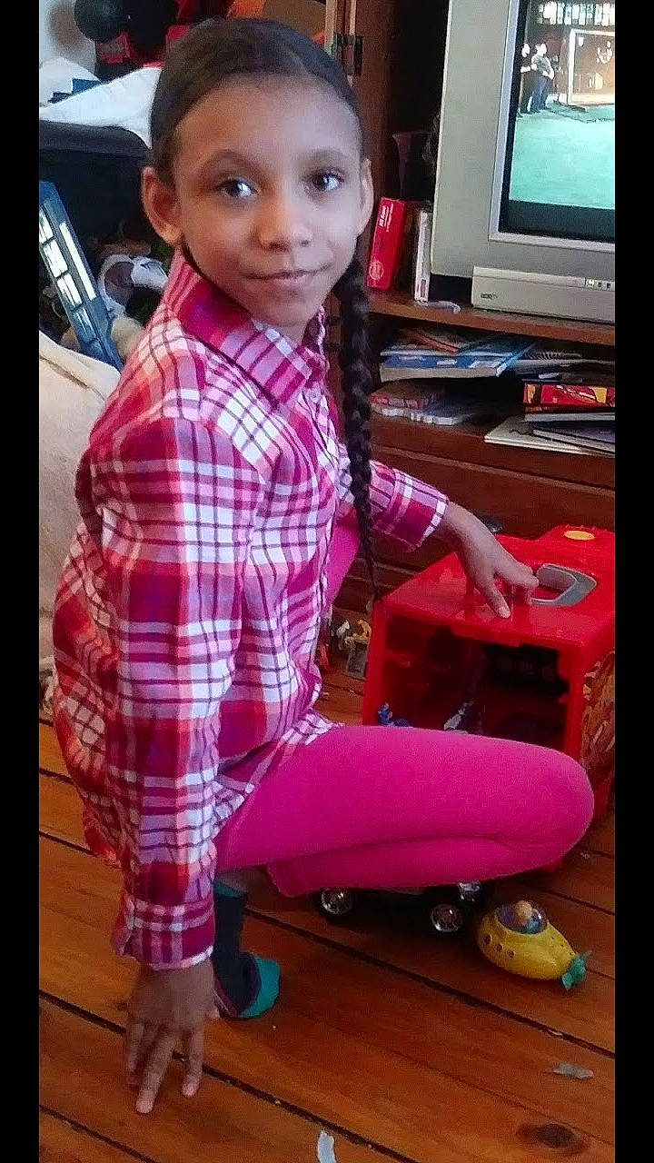 Saniyah is registered to the contest to win money with this photo: arm, child, cool, day, fun, girl, pattern, person, pink, play, product, sitting, skin, toddler