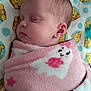 Estella is registered to the contest to win money with this photo: baby, blanket, child, cozy, cute, face, head, indoors, infant, pattern, peaceful, pink, portrait, rest, sheet, sleeping, soft, toddler, winnie_the_pooh, wrapped