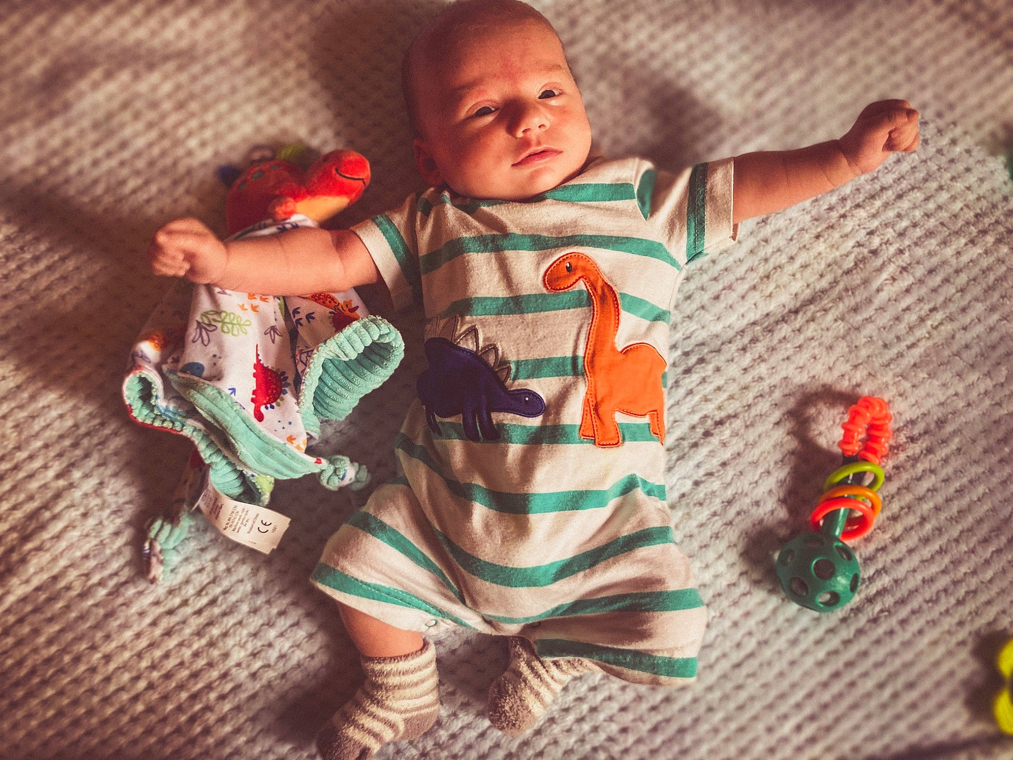 Deacon is registered to the contest to win money with this photo: baby, baby_sleeping, baby_toddler_clothing, child, comfort, cool, finger, hand, happy, linens, pattern, person, pink, skin, sleeve, t_shirt, textile, thumb, toddler, toy