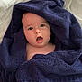 baby, towel, blue_towel, wrapped, surprised, expression, face, head, skin, infant, bedspread, white, texture, soft, cozy, indoor, person, child, portrait, cute