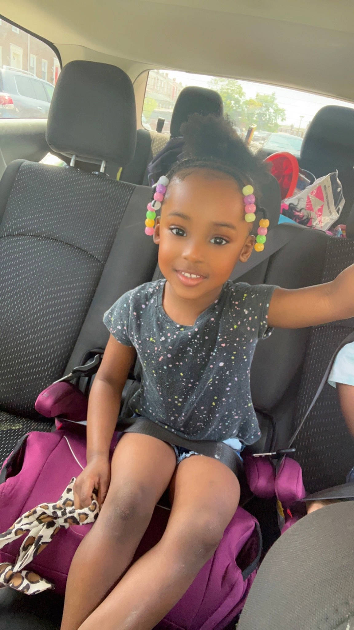 Morgan is registered to the contest to win money with this photo: auto_part, automotive_design, car, car_seat, car_seat_cover, child, comfort, family_car, fun, happy, head_restraint, human_leg, joy, lap, leisure, motor_vehicle, person, seat_belt, smile, thigh