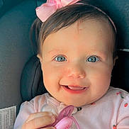 Laura joined the competition — help win amazing prizes! baby, infant, smiling, pacifier, pink_bow, blue_eyes, car_seat, child, cute, happy, portrait, hand, clothing, headband, closeup, face, girl, indoor, young_child, holding