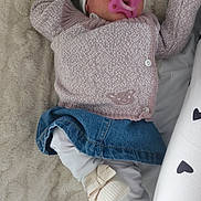 Hope participe au concours pour gagner de l'argent avec cette photo : baby, blanket, booties, bow, child, cozy, cute, denim_skirt, hat, indoor, infant, leggings, lying_down, newborn, pacifier, peaceful, sleeping, soft_texture, sweater, warm_clothing