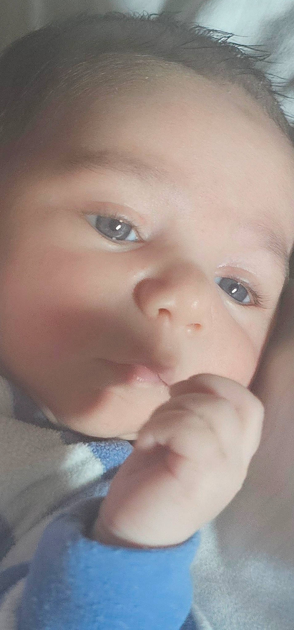 Ivan is registered to the contest to win money with this photo: baby, baby_toddler_clothing, cheek, chin, ear, eyebrow, eyelash, finger, forehead, gesture, hand, happy, iris, lip, mouth, nose, person, skin, smile, thumb