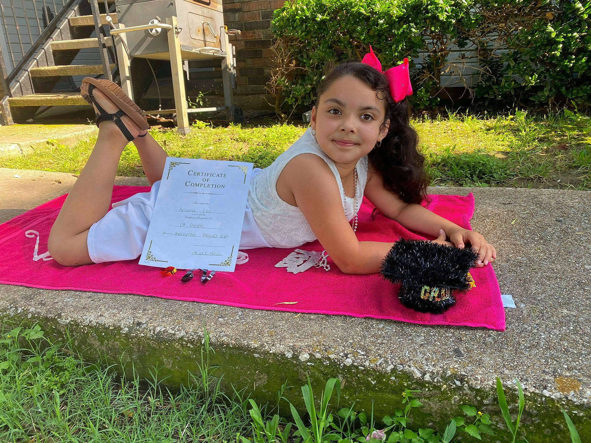 Ariana joined the competition — help win amazing prizes! arm, barefoot, facial_expression, fun, grass, hairstyle, happy, human_leg, joy, lawn, leisure, magenta, people_in_nature, person, pink, plant, public_space, recreation, shoe, summer