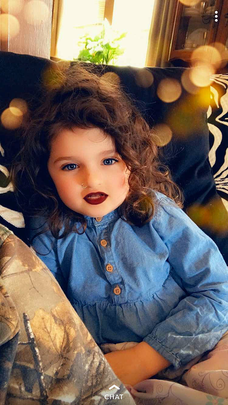 June is registered to the contest to win money with this photo: brown_hair, child, child_model, eye, hair, hairstyle, long_hair, person, sitting, toddler