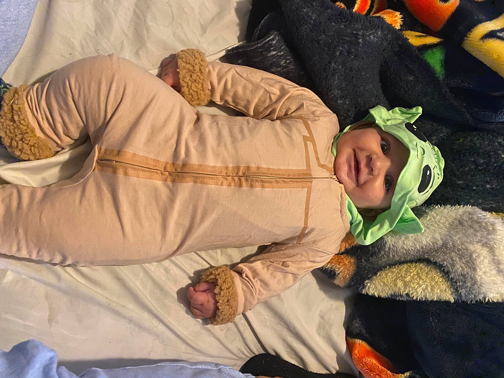 Angelo is registered to the contest to win money with this photo: baby, baby_products, child, comfort, fun, grass, happy, headwear, landscape, leisure, linens, nap, people_in_nature, person, sitting, sleep, smile, toddler, tree, vacation