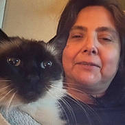 Fuchitacloudy joined the competition — help win amazing prizes! woman, cat, indoor, portrait, pet, face, closeup, cozy, furry, relaxed, smile, hair, whiskers, animal, person, warm_lighting, casual, friendship, companionship, candid