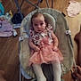 baby, baby_seat, blur, casual, child, clothing, dress, fabric, feet, floor, folding_chair, home, indoor, infant, legs, person, room, seat, sitting, wooden_floor