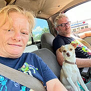 Baby Girl Spoil joined the competition — help win amazing prizes! car_interior, person, dog, seatbelt, glasses, tshirt, window, sky, clouds, bank_of_america, seat, blond_hair, short_hair, beard, pet, leash, daylight, casual_clothing, portrait, candid