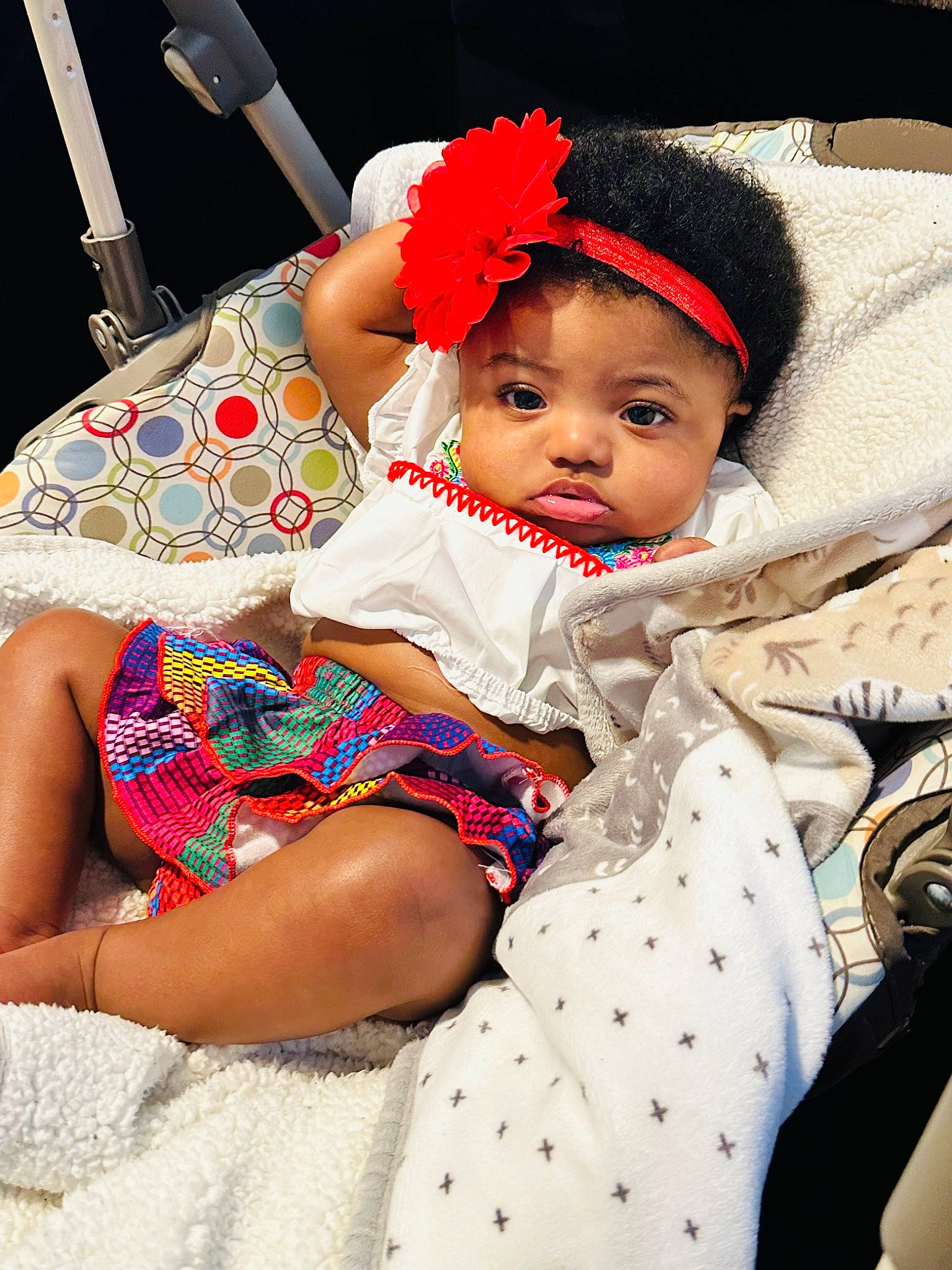 Ari joined the competition — help win amazing prizes! baby, baby_toddler_clothing, cap, child, clothing, comfort, eyelash, fashion_accessory, foot, fun, fur, happy, headband, headgear, human_leg, pattern, person, sitting, thigh, toddler