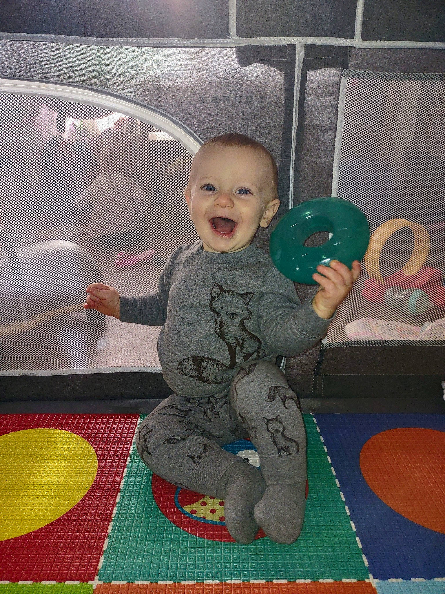 Deacon is registered to the contest to win money with this photo: baby_toddler_clothing, beauty, chair, child, comfort, floor, flooring, fun, happy, mammal, person, play, product, room, sitting, smile, t_shirt, toddler, toy, vehicle_door