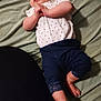 Stormi joined the competition — help win amazing prizes! baby, bed, blanket, casual, cute, foot, green_bedspread, hand, indoors, infant, lace_trim, lying_down, navy_pants, person, polka_dot, portrait, relaxed, skin, white_shirt, young_child