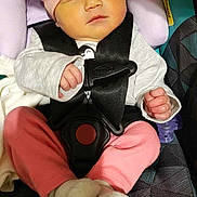 Stormy joined the competition — help win amazing prizes! baby, sleeping, car_seat, hat, bow, pink_clothing, socks, child, infant, seat_belt, safety, toddler, cute, resting, indoors, portrait, person, closeup, comfort, peaceful