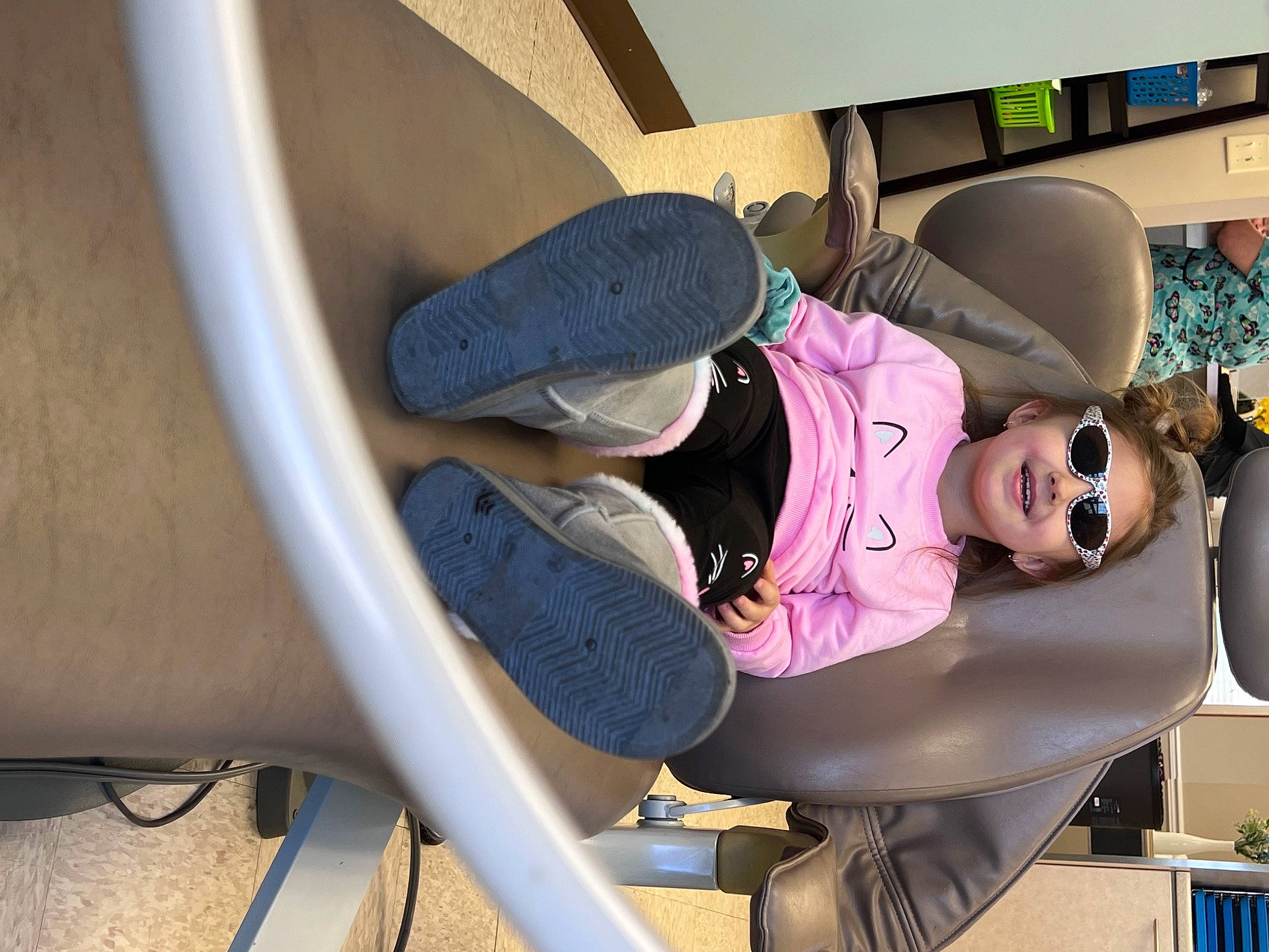 Madelyn is registered to the contest to win money with this photo: auto_part, automotive_design, automotive_exterior, automotive_wheel_system, car_seat, child, comfort, eyewear, fun, hat, human_leg, joy, knee, luxury_vehicle, person, sitting, sneakers, sunglasses, thigh, tire
