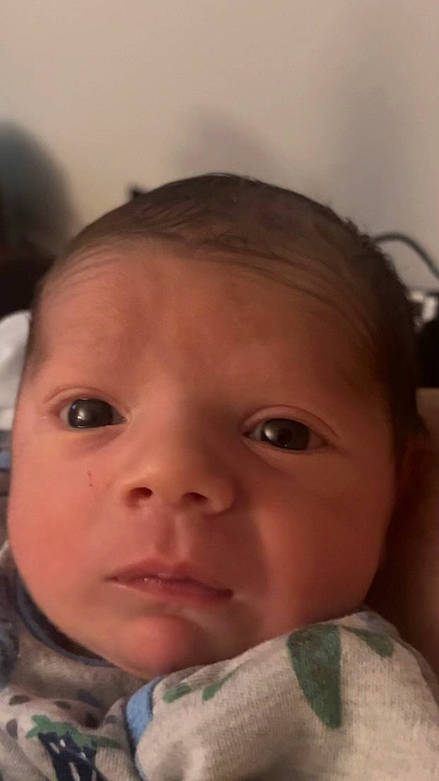 Gio is registered to the contest to win money with this photo: baby, black_hair, cheek, child, chin, close_up, ear, eye, eyebrow, eyelash, forehead, fun, happy, iris, jaw, lip, mouth, nose, person, skin