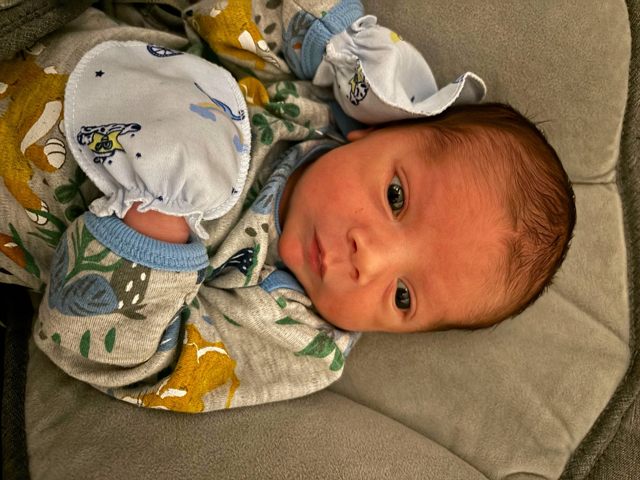 Gio joined the competition — help win amazing prizes! baby, baby_products, baby_safety, baby_toddler_clothing, cheek, child, comfort, face, hat, headgear, linens, pattern, person, room, sitting, skin, textile, toddler, wood