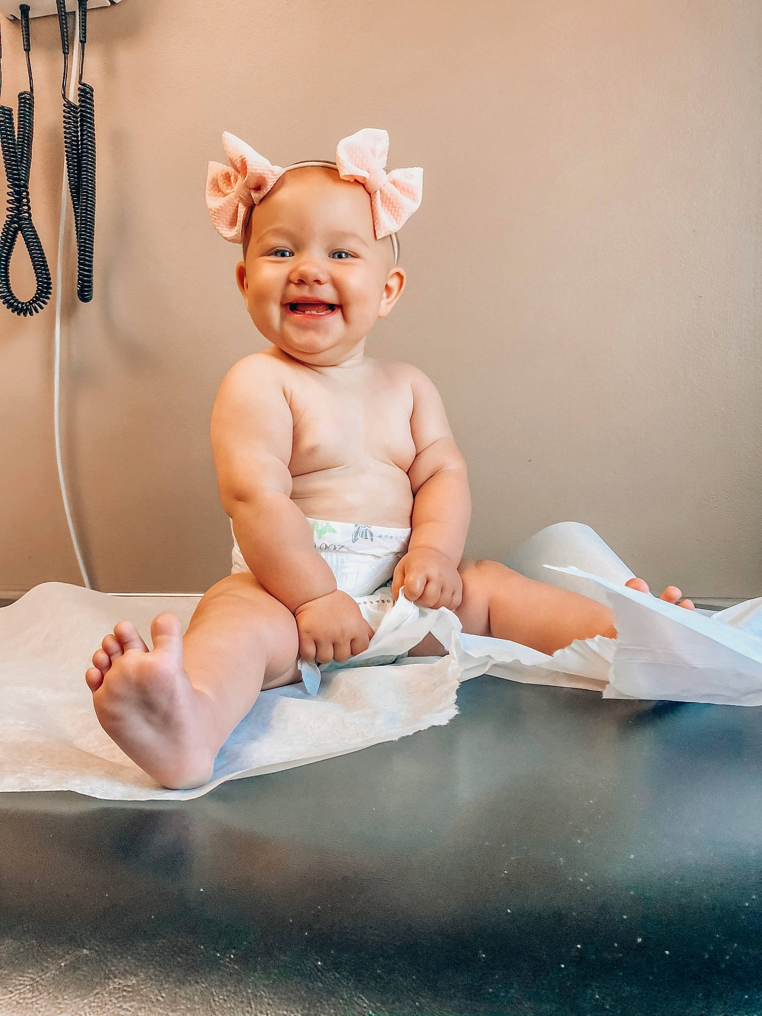 Indie is registered to the contest to win money with this photo: baby, child, hair_accessory, hand, happy, joy, leg, person, photograph, photography, portrait_photography, sitting, skin, smile, toddler
