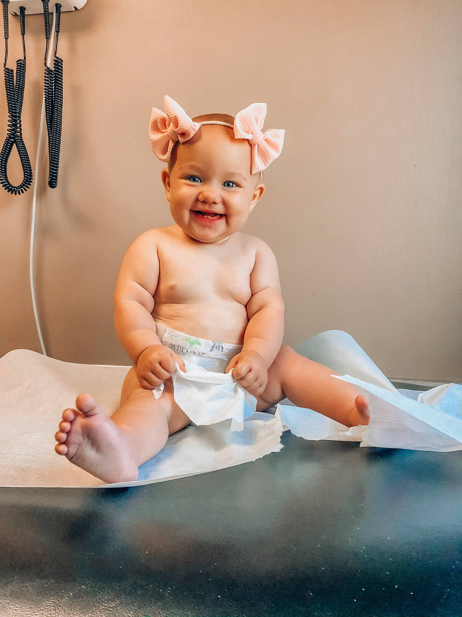 Indie is registered to the contest to win money with this photo: baby, baby_toddler_clothing, blond, child, costume, diaper, hair_accessory, headband, headpiece, joy, leg, person, photography, shoe, sitting, skin, smile, toddler