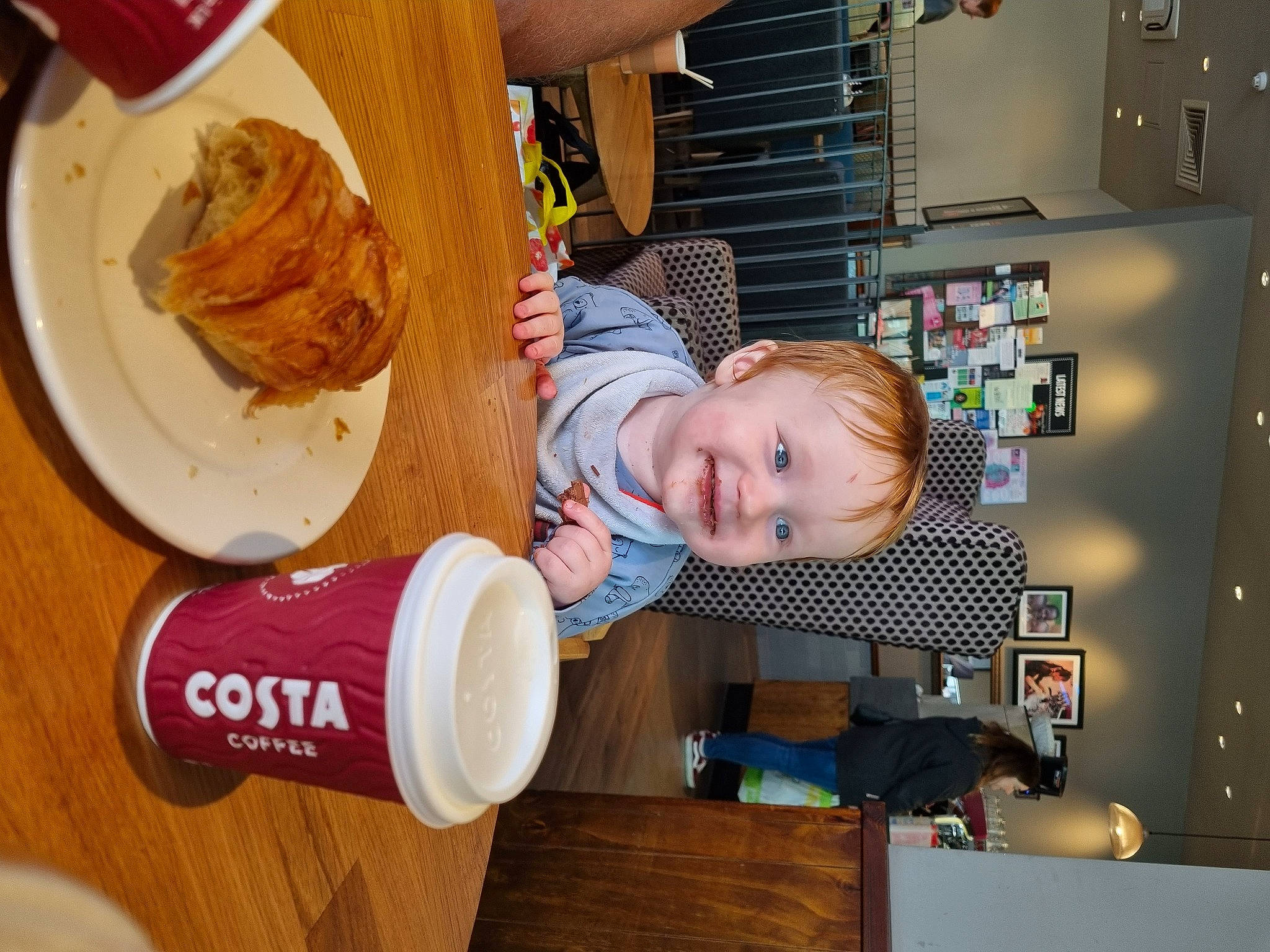 Peter joined the competition — help win amazing prizes! baby, blurred, chair, child, coffee_cup_sleeve, comfort_food, cup, drinkware, food, fun, joy, person, plate, room, shelf, shelving, smile, t_shirt, table, tableware