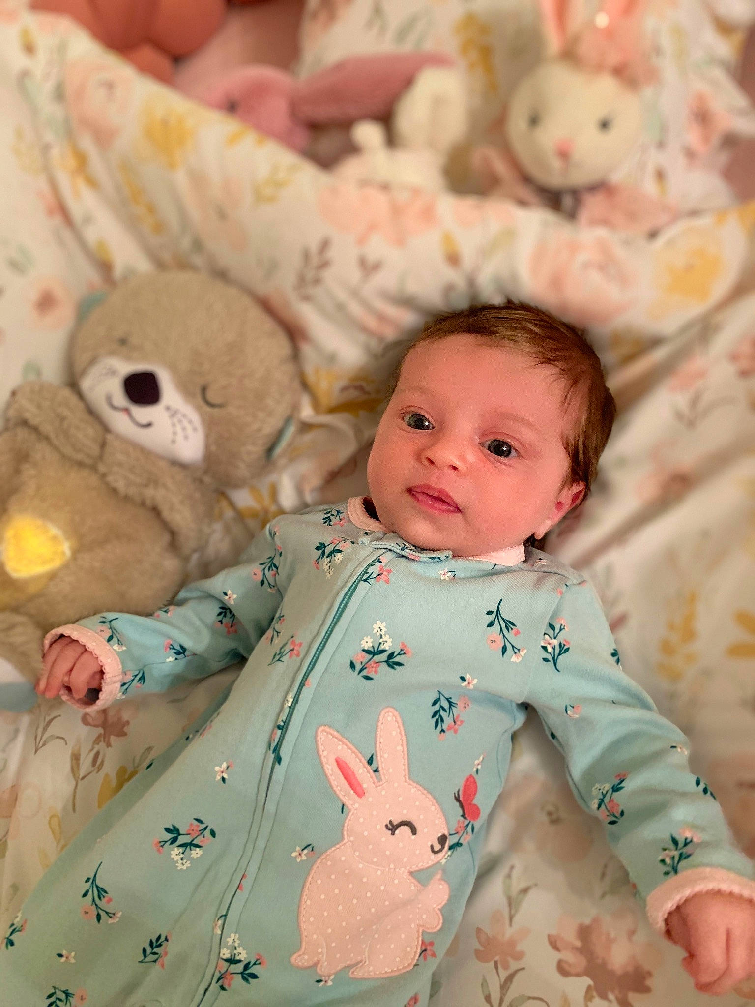 Karlee is registered to the contest to win money with this photo: baby, baby_toddler_clothing, cheek, child, comfort, facial_expression, happy, linens, mammal, pattern, person, pink, product, skin, sleeve, smile, textile, toddler, toy, vertebrate
