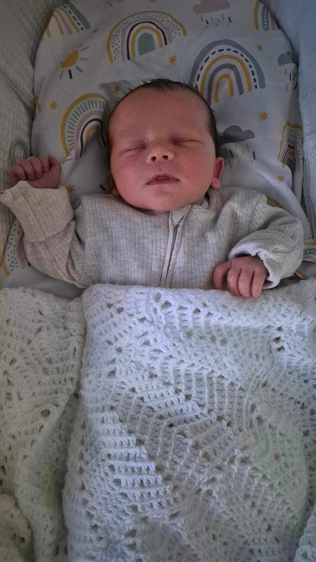 Luca joined the competition — help win amazing prizes! baby, newborn, sleeping, blanket, crochet, pillow, rainbow, pattern, infant, bed, cozy, soft, clothing, hand, face, peaceful, indoor, rest, cute, child