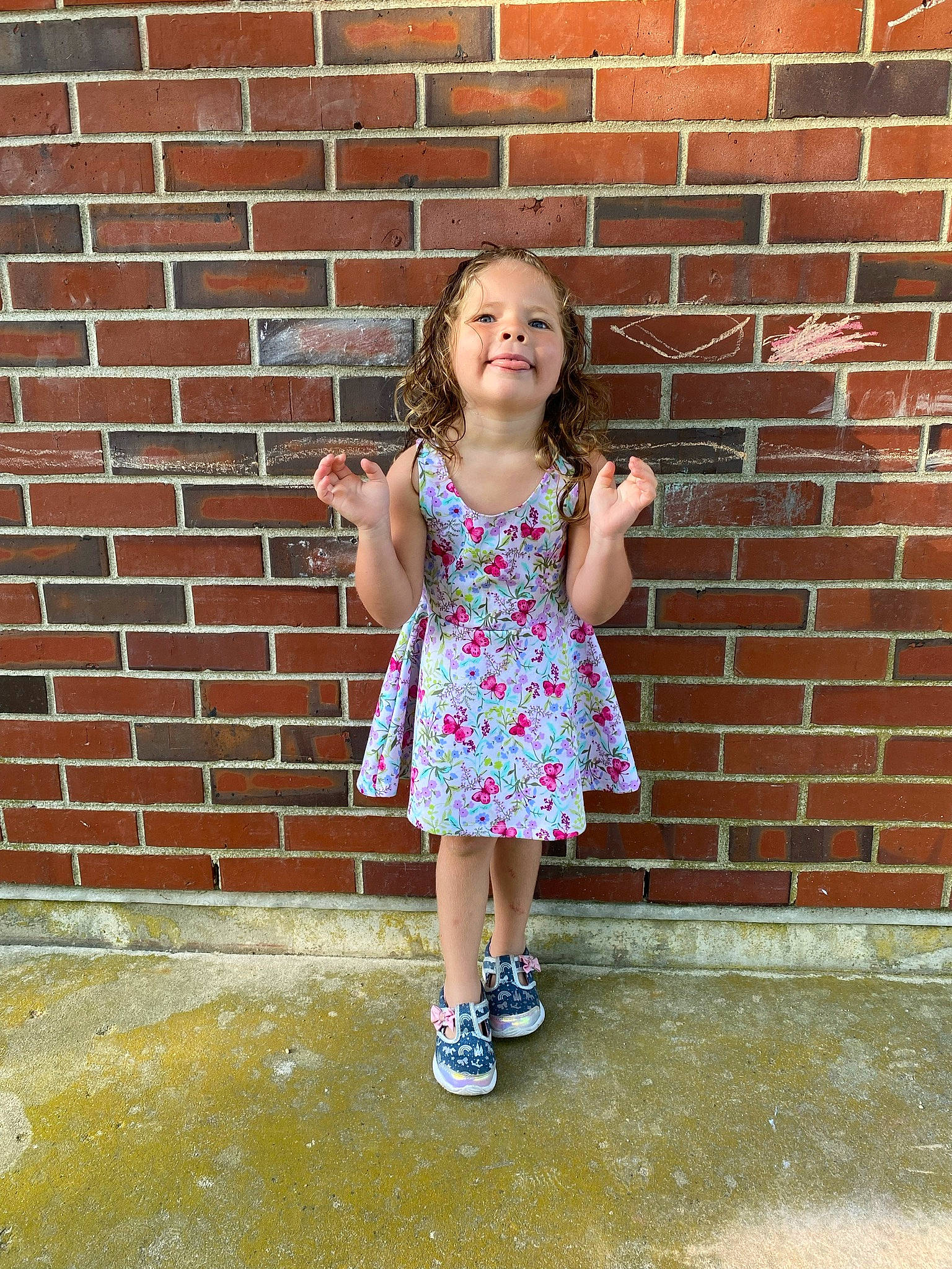 Sophia joined the competition — help win amazing prizes! brick, brickwork, child, clothing, eye, fun, grass, happy, human_leg, joy, leisure, magenta, pattern, person, pink, portrait_photography, sitting, standing, street_fashion, toddler