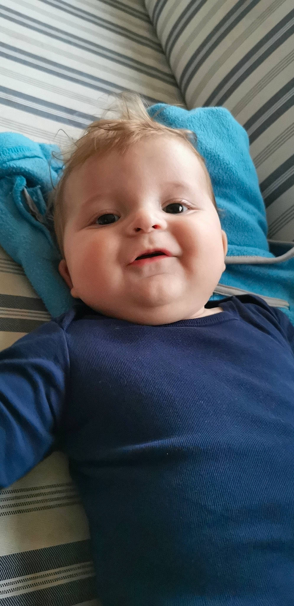 Denzo participe au concours pour gagner de l'argent avec cette photo : azure, baby, baby_toddler_clothing, cheek, chin, comfort, electric_blue, eye, eyebrow, fun, happy, hat, iris, lip, mouth, nose, person, skin, sleeve, smile