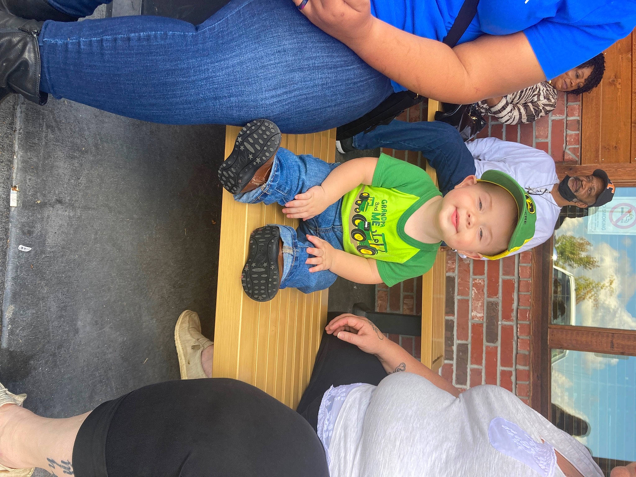 Dyllan is registered to the contest to win money with this photo: arm, blue, clothing, elbow, fun, gesture, hand, happy, hat, headwear, joint, joy, knee, leg, leisure, person, shoe, shorts, sneakers, t_shirt