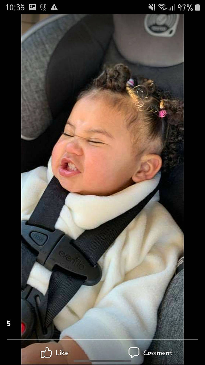 Kyra is registered to the contest to win money with this photo: audio_equipment, baby, baby_products, baby_toddler_clothing, car_seat, cheek, child, comfort, ear, eyelash, fashion_accessory, flash_photography, formal_wear, gadget, happy, neck, nose, person, sitting, tie