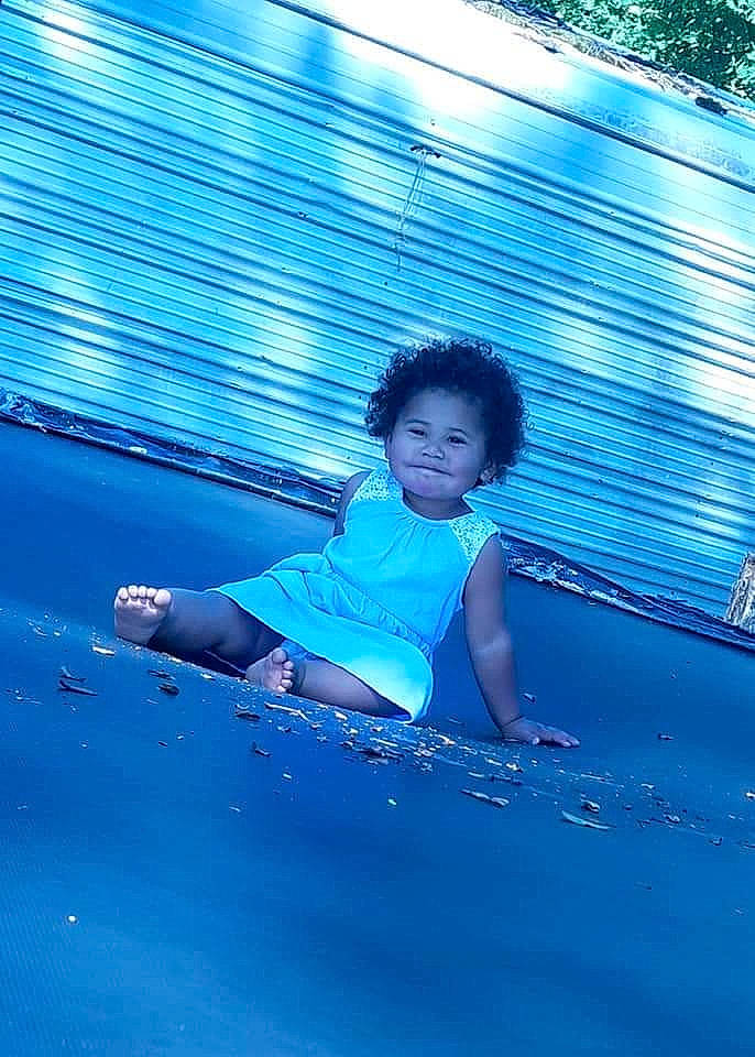 Kyra is registered to the contest to win money with this photo: azure, blue, child, cloud, elbow, electric_blue, flash_photography, fun, happy, human_leg, joy, leisure, ocean, people_in_nature, person, recreation, shadow, sitting, sky, tints_and_shades