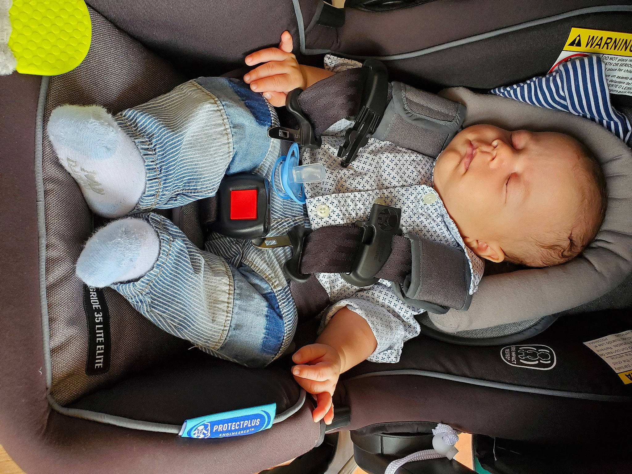 Eric is registered to the contest to win money with this photo: auto_part, baby, baby_carriage, baby_in_car_seat, baby_products, baby_sleeping, car_seat, child, comfort, nap, person, product, seat_belt, sitting, sleep, toddler