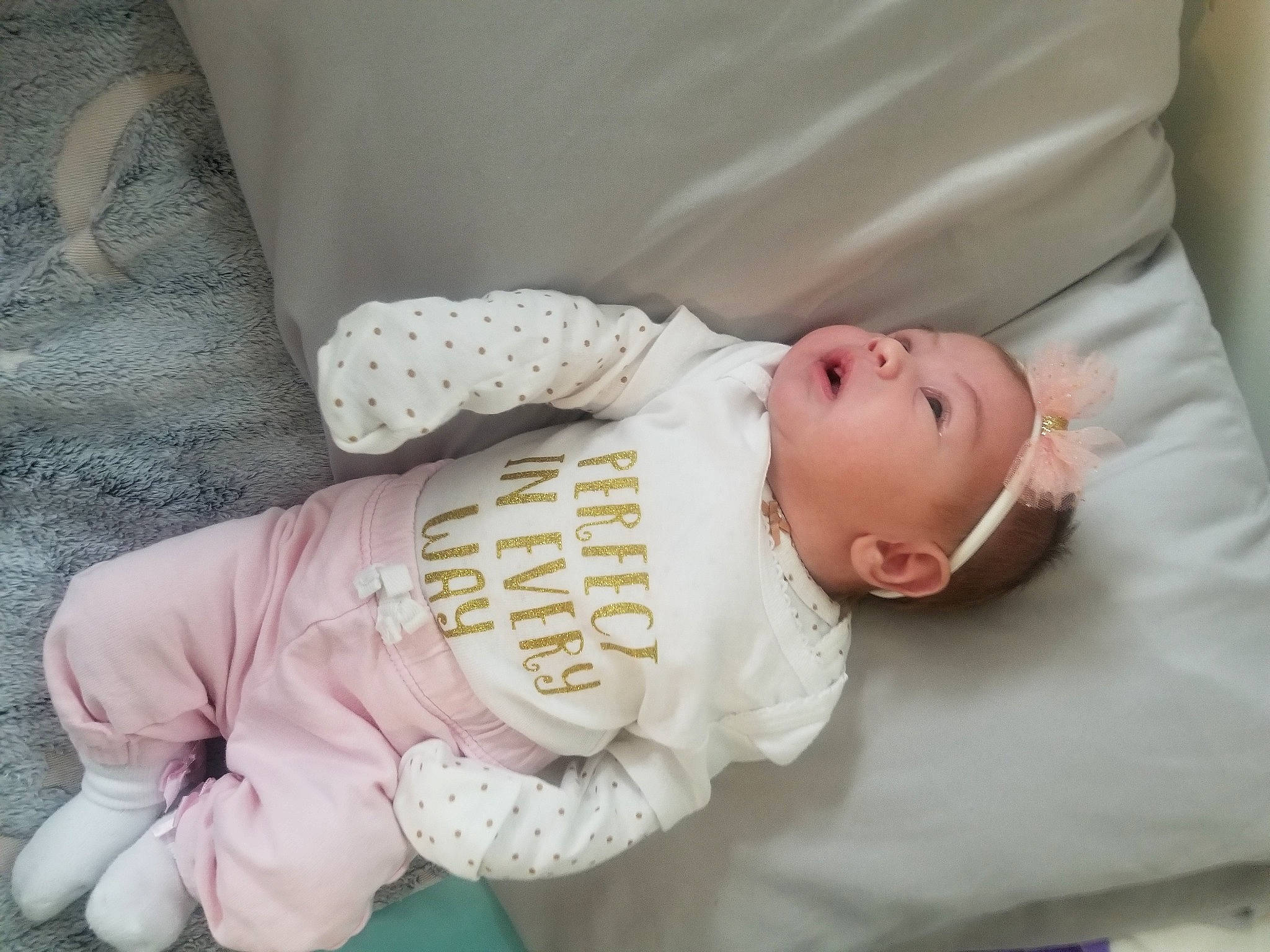 Alayah is registered to the contest to win money with this photo: baby, baby_products, baby_safety, baby_sleeping, baby_toddler_clothing, bedding, cheek, child, comfort, human_body, linens, pattern, person, portrait_photography, room, sitting, skin, sleeve, toddler