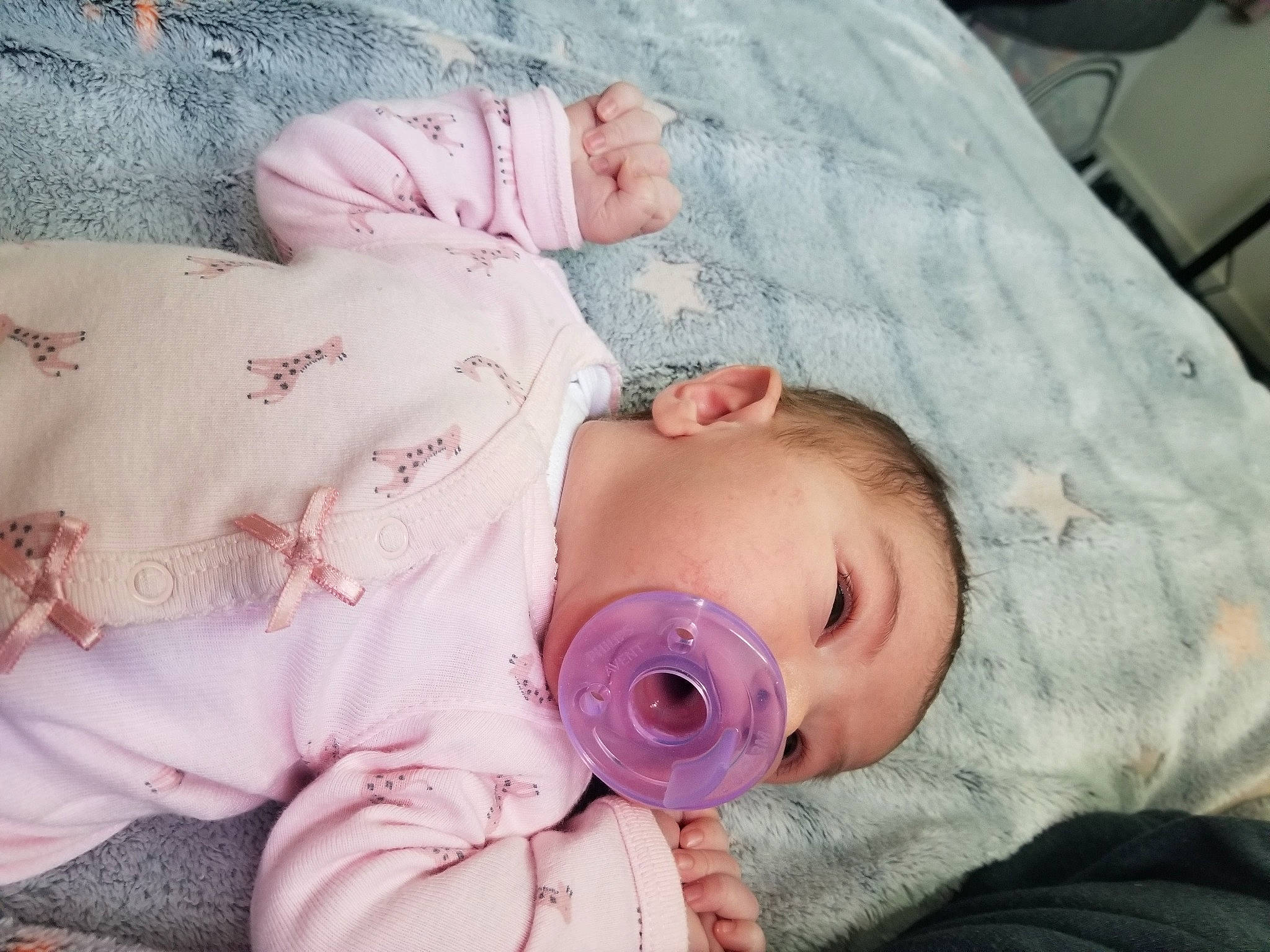 Alayah is registered to the contest to win money with this photo: baby, baby_products, baby_toddler_clothing, cheek, child, comfort, eye, eyelash, finger, hand, headgear, linens, lip, mouth, nose, pattern, person, pink, skin, sleeve