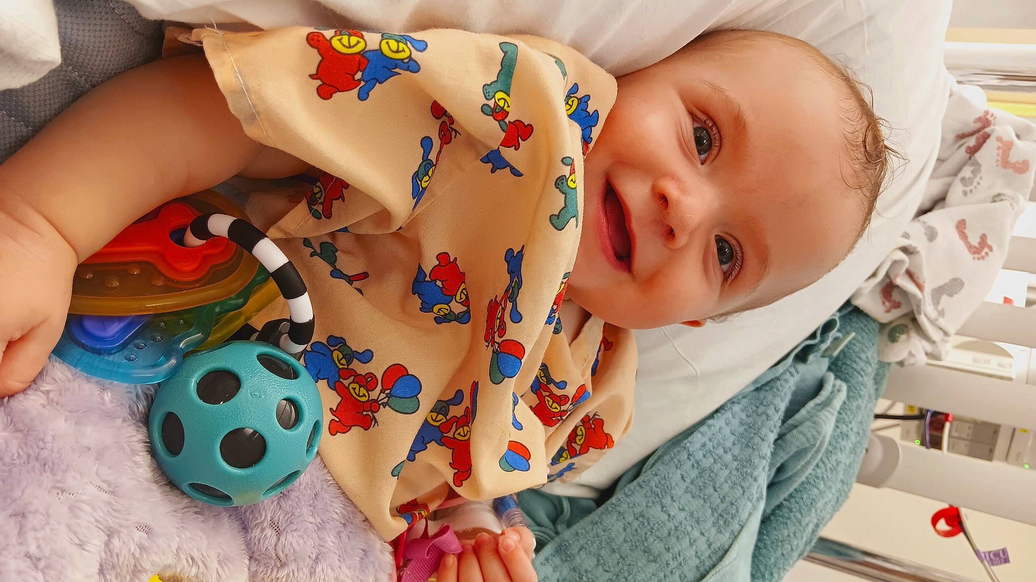 Kimber is registered to the contest to win money with this photo: art, baby, baby_playing_with_toys, baby_products, baby_toddler_clothing, chest, child, fun, happy, joy, mouth, nail, pattern, person, play, room, smile, stuffed_toy, textile, toddler
