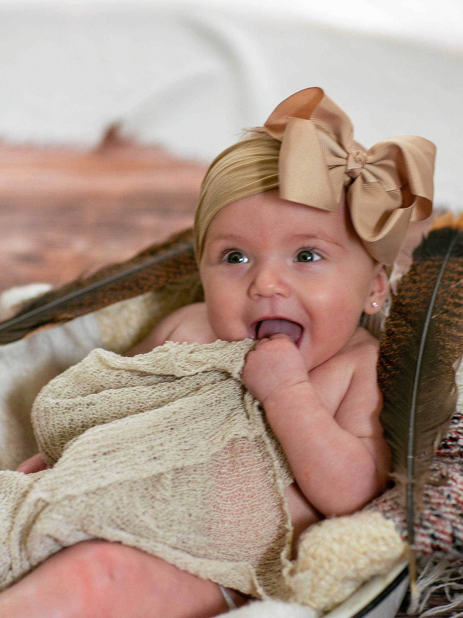 Kimber joined the competition — help win amazing prizes! baby, cap, child, fashion_accessory, fun, fur, happy, hat, head, headgear, headpiece, headwear, jewellery, linens, people_in_nature, person, portrait_photography, sitting, skin, sun_hat