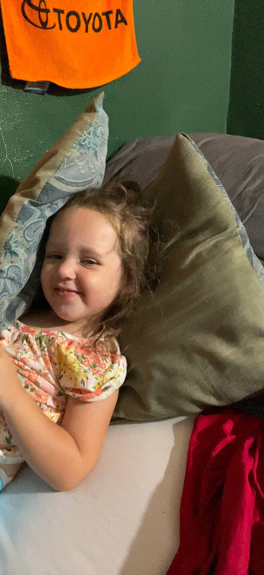 Aubreigh joined the competition — help win amazing prizes! arm, child, comfort, fun, grass, hairstyle, happy, joy, laugh, leisure, linens, long_hair, mouth, pattern, person, pink, room, sitting, smile, t_shirt