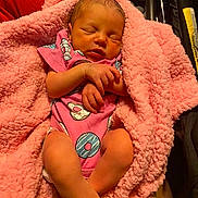 Nala joined the competition — help win amazing prizes! newborn, baby, sleeping, pink_blanket, onesie, donut_pattern, infant, cozy, cute, soft_texture, car_seat, stroller, peaceful, hands_crossed, indoor, clothing, portrait, child, resting, small