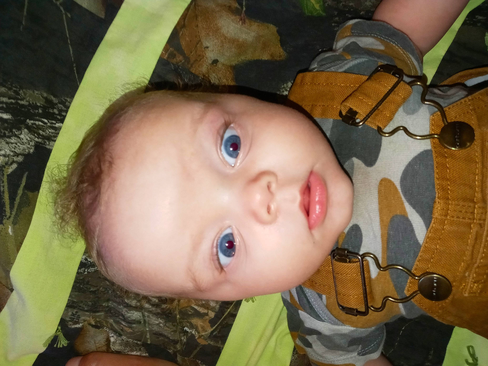 Simon is registered to the contest to win money with this photo: baby, baby_toddler_clothing, cheek, child, eyebrow, eyelash, fashion_accessory, fun, grass, happy, iris, leaf, lip, nose, organ, person, plant, skin, toddler, tree