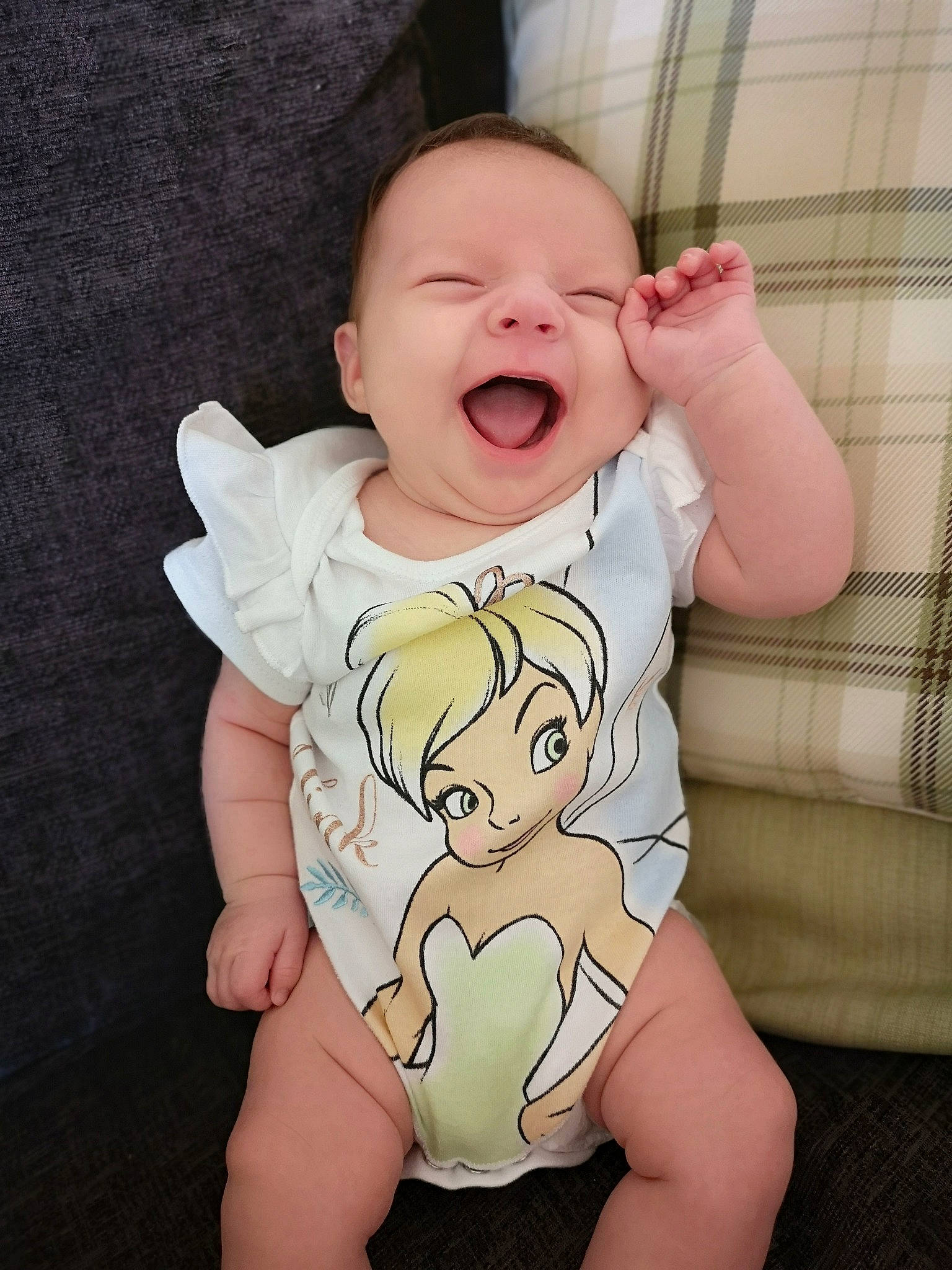 Harriet is registered to the contest to win money with this photo: arm, baby, baby_toddler_clothing, cheek, child, facial_expression, finger, hand, happy, head, human, laugh, leg, mouth, person, product, skin, sleeve, smile, toddler