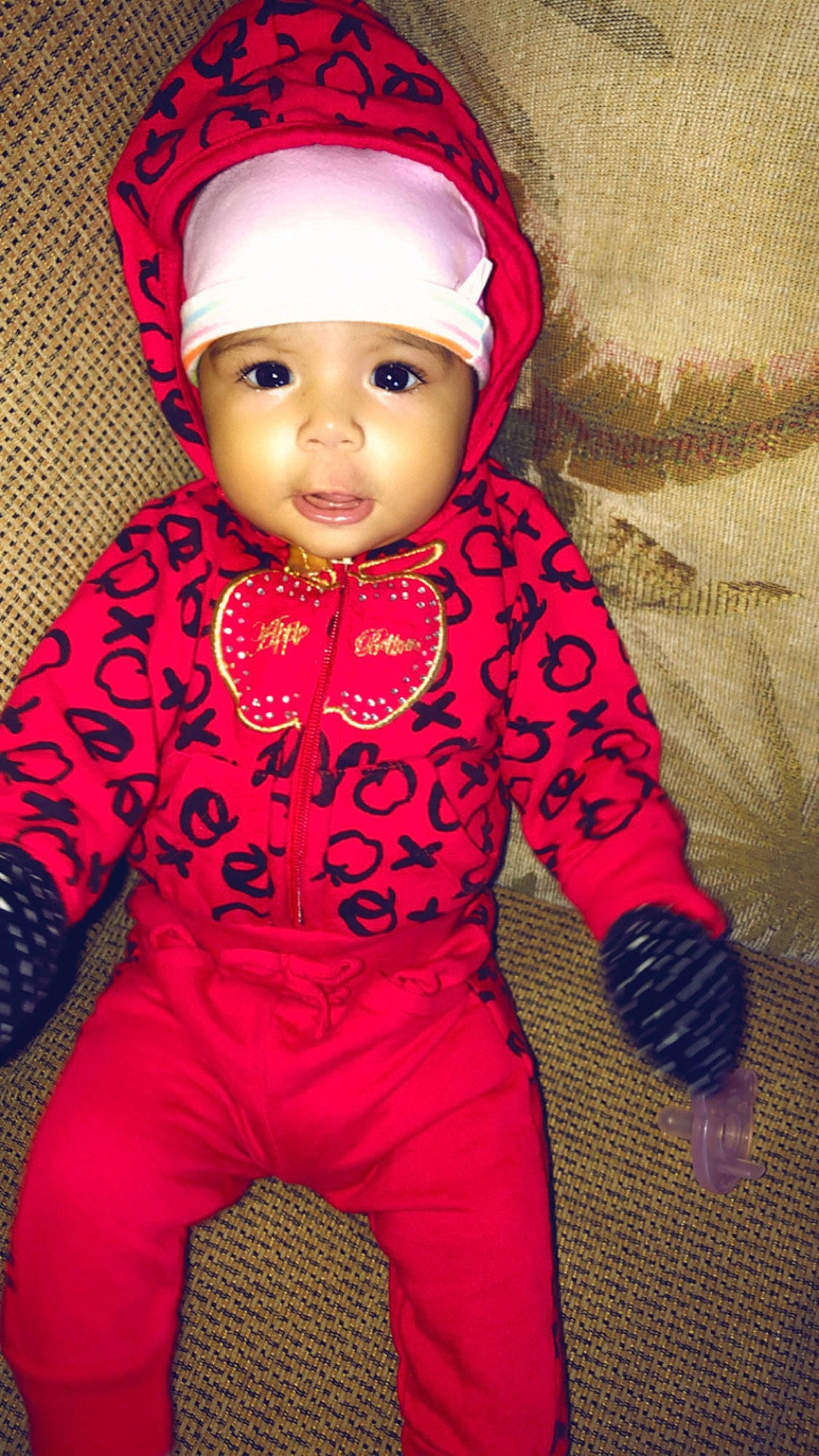 Miyah is registered to the contest to win money with this photo: baby, baby_toddler_clothing, cheek, child, doll, head, headgear, headwear, outerwear, person, pink, toddler, toy