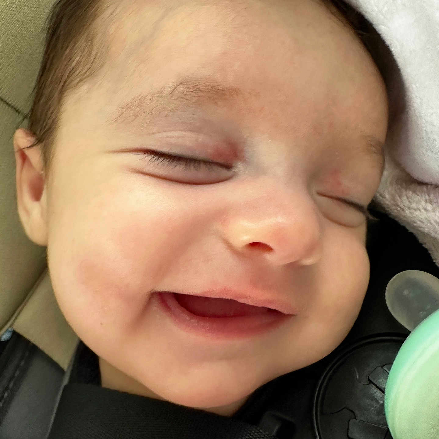 Kasey joined the competition — help win amazing prizes! baby, babylaughing, bodypart, clothing, coat, cushion, face, happy, head, homedecor, jacket, laughing, mouth, newborn, person, photography, portrait, sleeping, smile, teeth