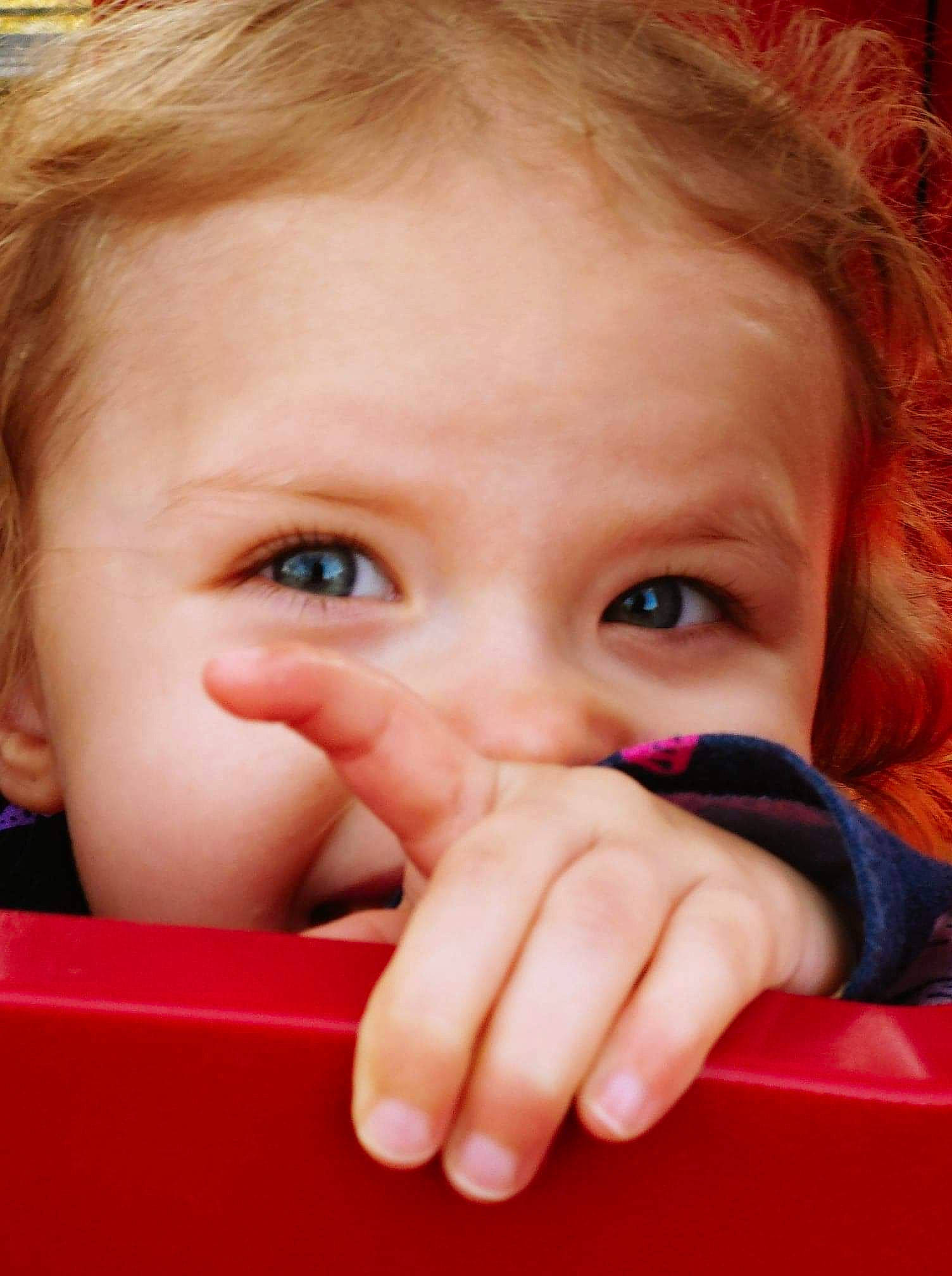 Gabriella joined the competition — help win amazing prizes! baby, blond, cheek, child, chin, close_up, eye, eyebrow, face, facial_expression, finger, forehead, hand, head, iris, lip, mouth, nose, person, skin