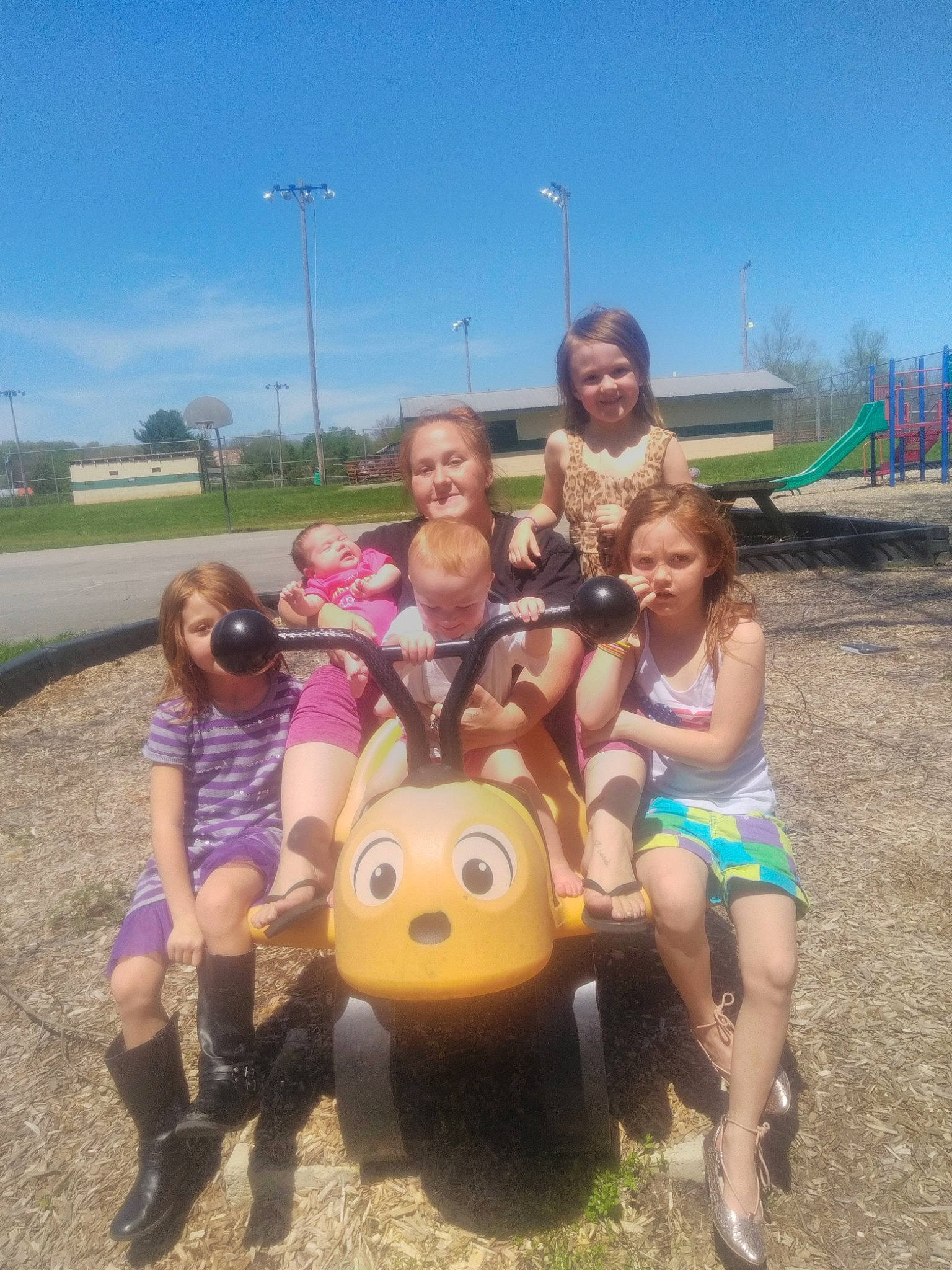 Shyann is registered to the contest to win money with this photo: car, child, family, fun, happy, joy, leisure, mud, people, person, plant, play, playground, public_space, recreation, smile, summer, tree, vacation, vehicle