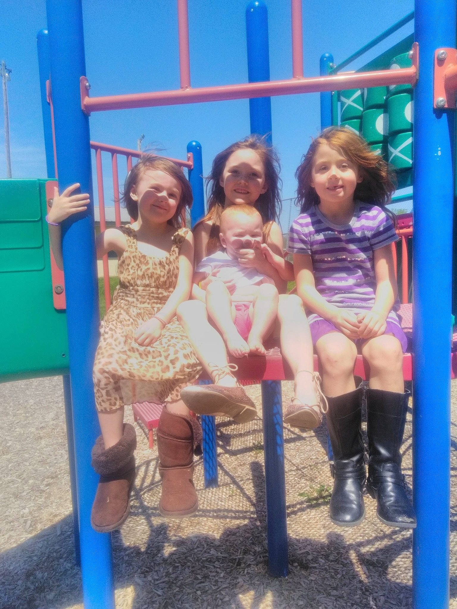 Jessica joined the competition — help win amazing prizes! child, city, fun, human_settlement, joy, leisure, outdoor_play_equipment, person, play, playground, public_space, recreation, smile, swing, toddler