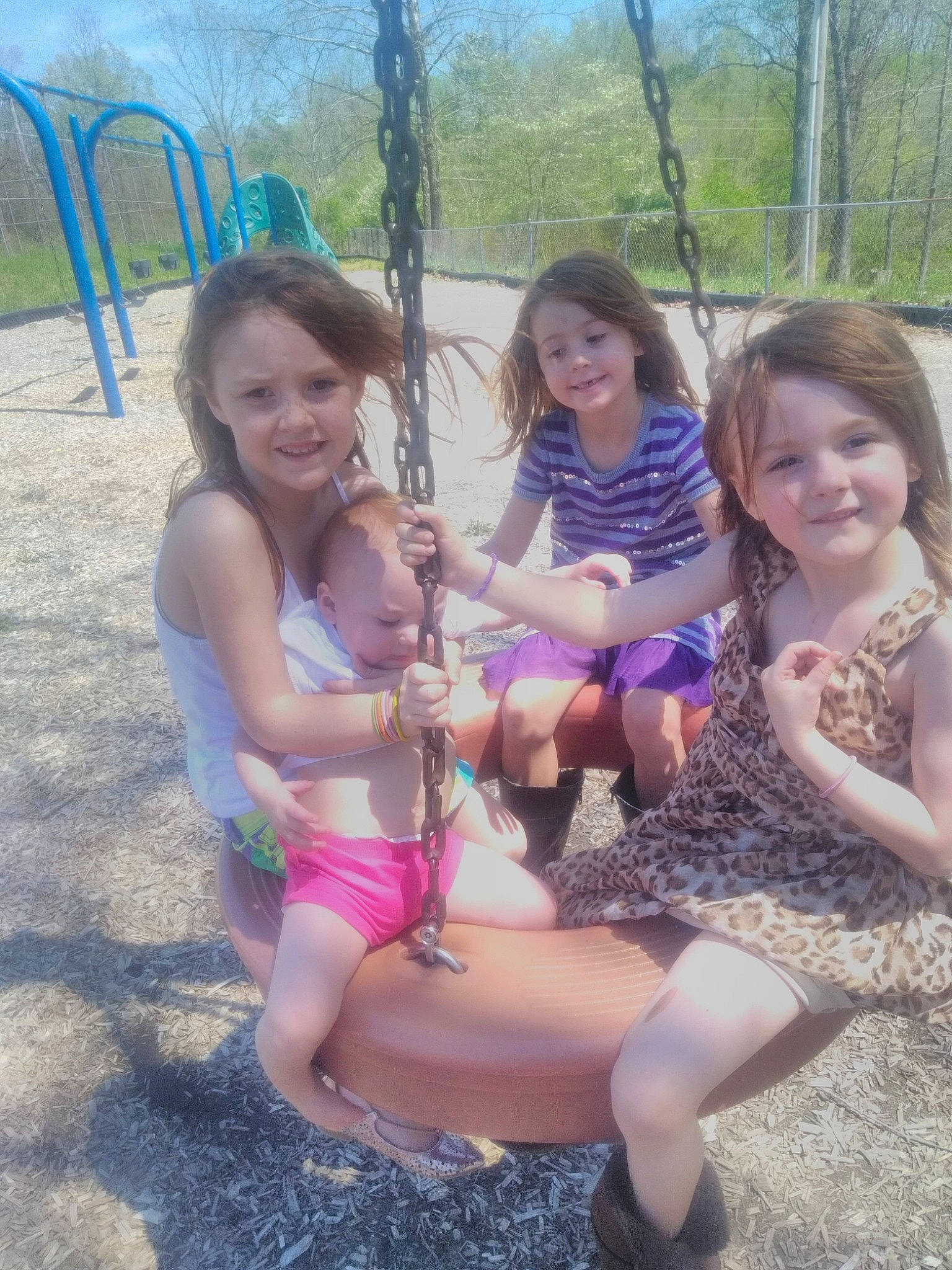 Jessica is registered to the contest to win money with this photo: child, family, fawn, fun, happy, joy, leisure, people, person, plant, play, recreation, sibling, sitting, smile, style, summer, swing, toddler, tree