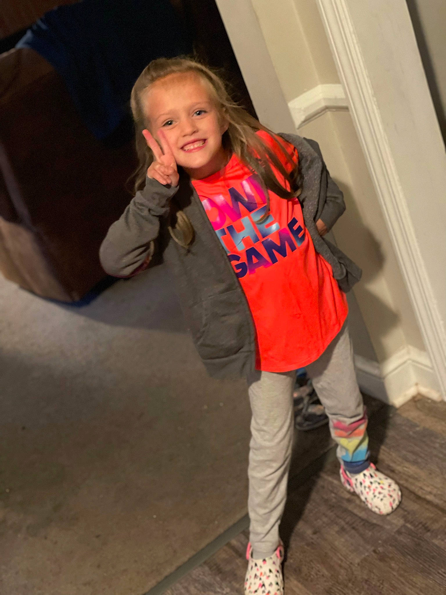 Katie joined the competition — help win amazing prizes! fashion, fashion_design, flash_photography, flooring, footwear, fun, happy, human_leg, joy, knee, orange, outerwear, person, shoe, sleeve, smile, sneakers, sportswear, t_shirt, textile