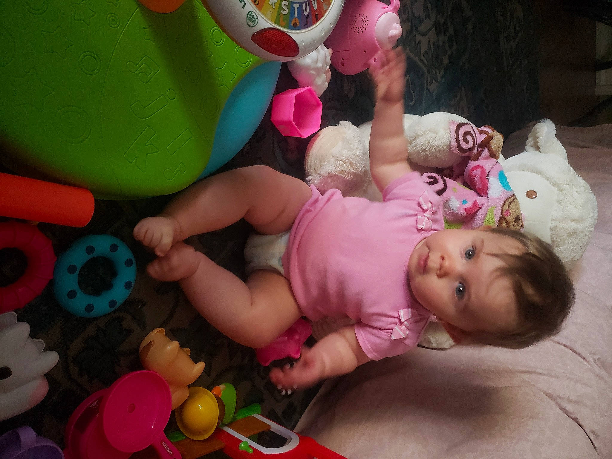 Abbigail joined the competition — help win amazing prizes! baby, baby_playing_with_toys, baby_toddler_clothing, beauty, cheek, child, fun, green, happy, leisure, magenta, person, pink, play, product, skin, snapshot, textile, toddler, toy