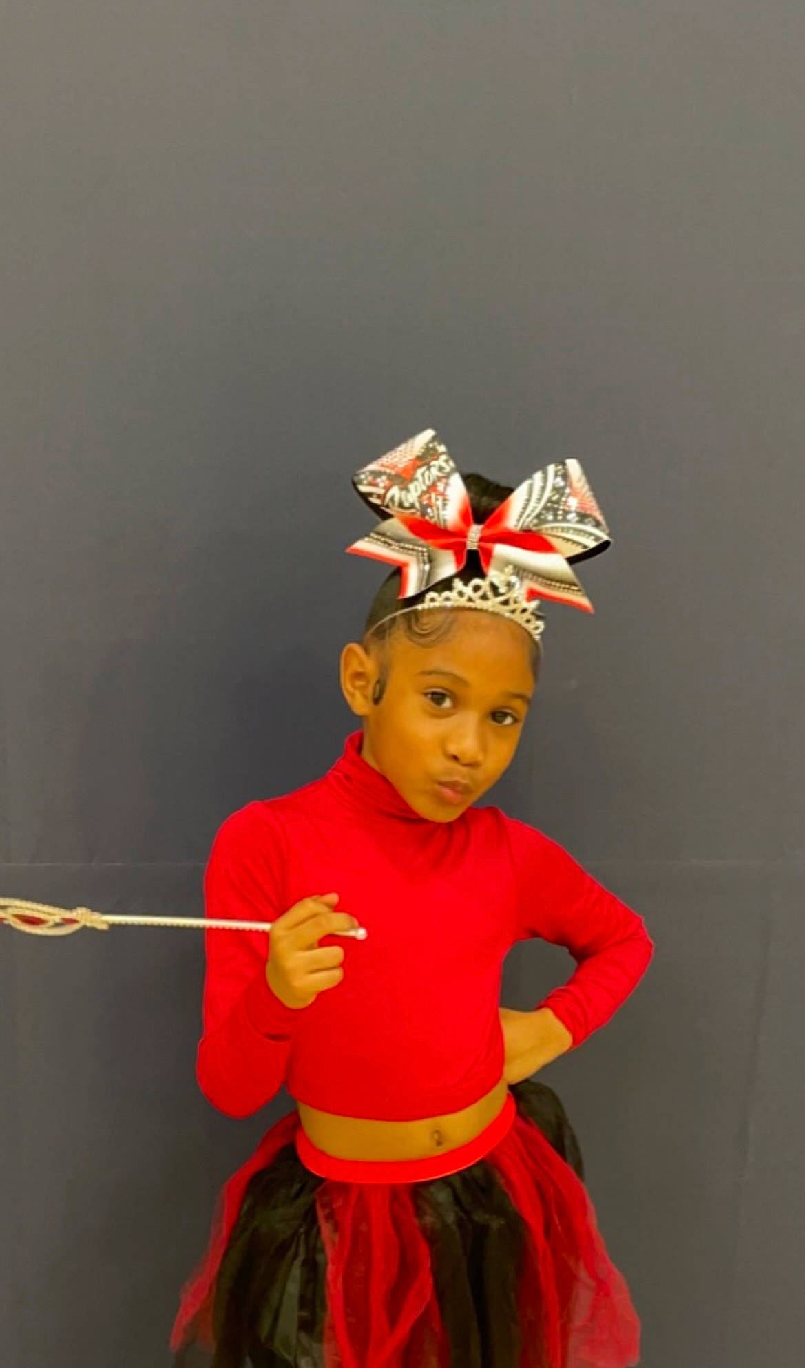 Alaysia is registered to the contest to win money with this photo: child, costume, costume_design, costume_hat, entertainment, event, fashion_accessory, fashion_design, hair_accessory, hat, head, headgear, headpiece, human_body, peach, performing_arts, person, sleeve, toddler, tradition