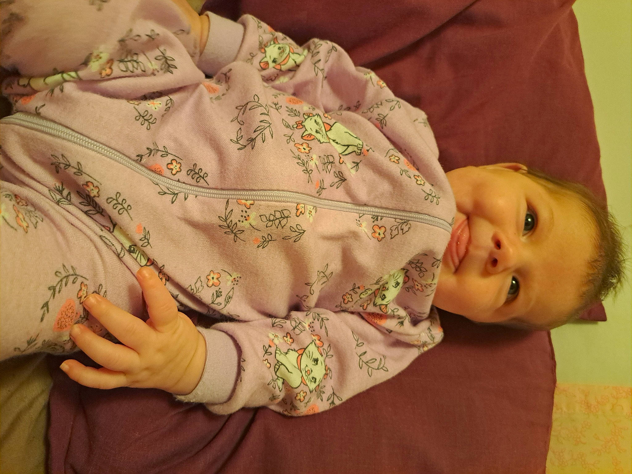 Noella joined the competition — help win amazing prizes! baby, baby_toddler_clothing, child, comfort, facial_expression, finger, gesture, happy, headgear, mammal, mouth, nail, pattern, person, skin, sleeve, smile, textile, thumb, toddler